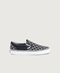 Vans - Sneakers UA Classic Slip-On från Vans har schackrutig ovandel i textil med vadderad kant och resårer på sidorna om vristen. Vans-märke bak på sulkanten.