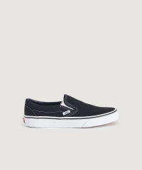 Vans - Sneakers UA Classic Slip-On från Vans med ovandel i canvas. Resårkilar på båda sidor om vristen.