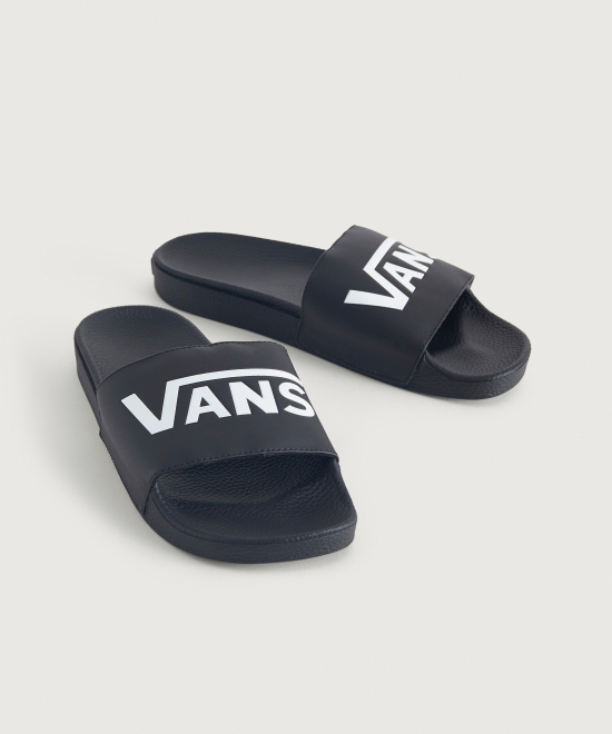 Vans Sandaler från Vans i gummi. Sandalerna har en rem med en logotyp och som är vadderad.